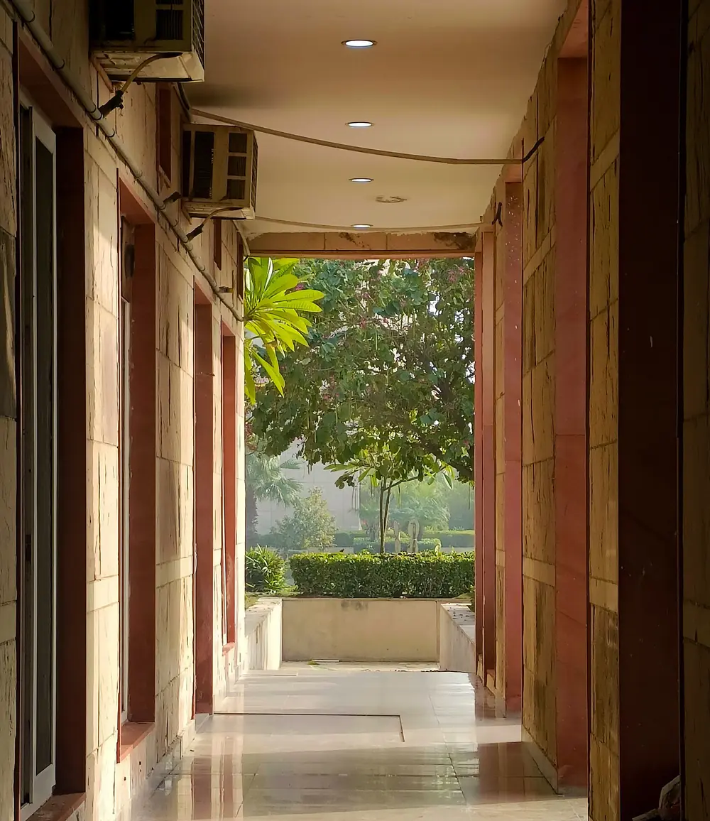 An empty hostel corridor in daylight